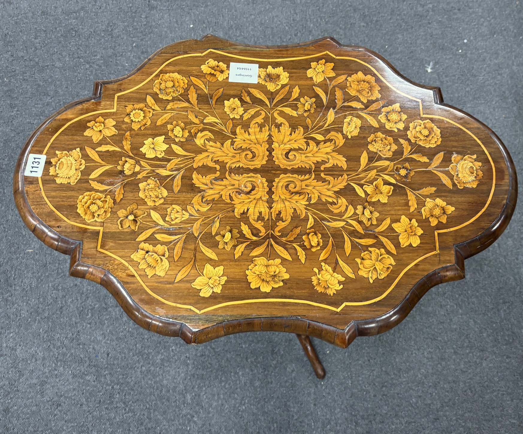 A 19th century Dutch floral marquetry inlaid walnut tilt top tripod table, width 67cm, depth 45cm, height 65cm